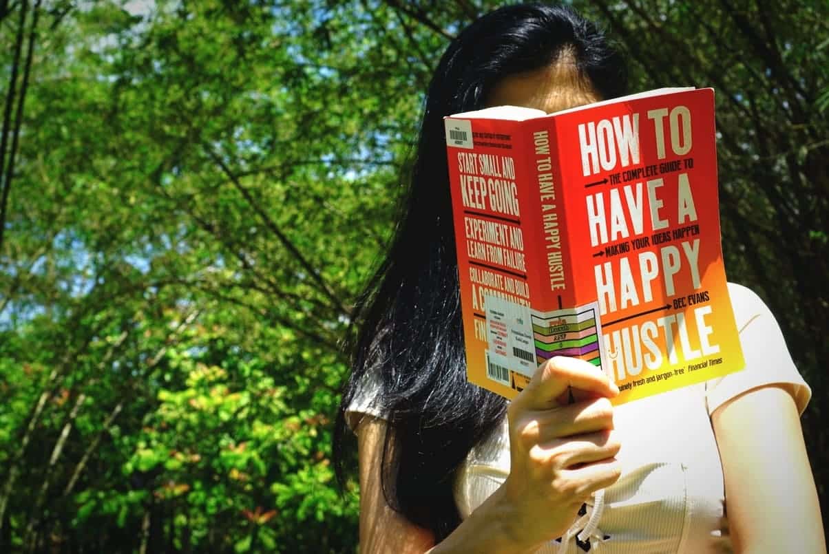 Front cover of How to have a happy hustle by bec evans book review