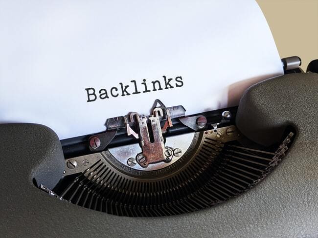 backlinks - typewriter - Factors That Affect Search Engine Ranking.