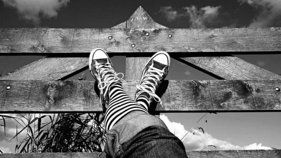 The Power of Productive Procrastination - leg-black-and-white-striped-socks