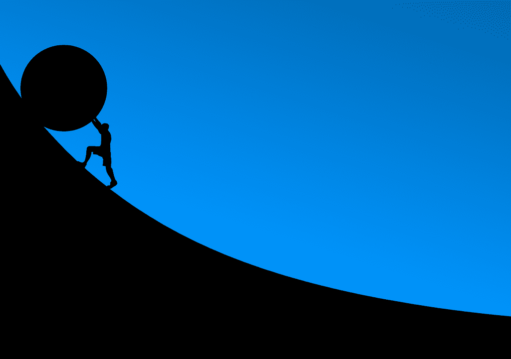 Pushing-boulder-silhoutte- Overcoming Mind Barriers